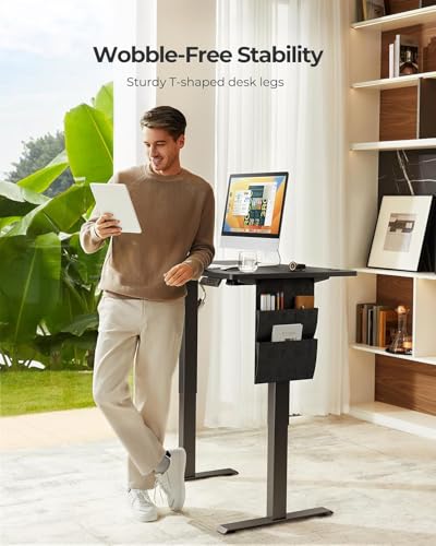 HUANUO Electric Standing Desk, 48 x 24 Inch Height Adjustable Computer Desk with Storage Bag, 4 Height Memory Settings, Sit Stand Up Desk for Home Office, Black