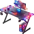 HLDIRECT 47 Inch Gaming Desk with LED Lights, Ergonomic Computer Gaming Table with Carbon Fibre Surface, Sturdy PC Workstation Desk for Home Office with Headphone Hook, Cup Holder, Black