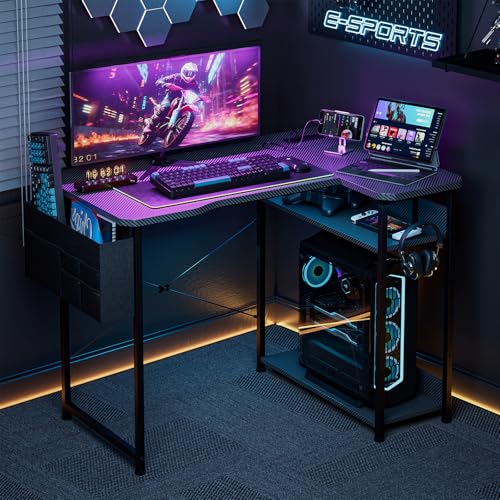 Acrolix L Shaped Gaming Desk 40 Inch - Computer Corner Desk with Power Outlets, Reversible Shelves & Storage Bag for Home Office, PC Gaming Table, Black Carbon