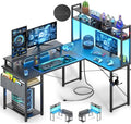 Besiost Small L Shaped Desk Gaming Desk with Power Outlets, 48" Reversible L Shaped Computer Desk with Monitor Stand & Storage Shelf, Corner Gamer Desk Home Office Desk with Storage Bag, Black