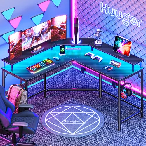 Huuger L Shaped Gaming Desk with Power Outlets & LED Lights, Computer Desk with Monitor Shelves, Carbon Fiber Surface, Home Office Desk, Corner Gaming Desk with Hooks, Carbon Fiber Black